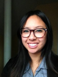 image of Annie Pho, woman with black hair and glasses smiling