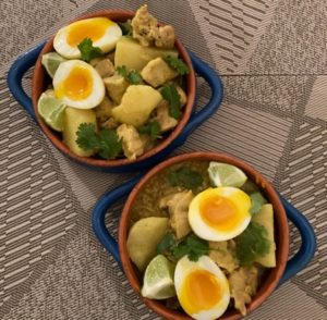 Two bowls of kuku paka, or coconut curry chicken