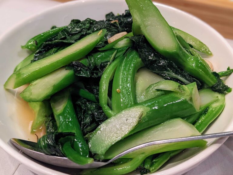 Gai lan in a white bowl