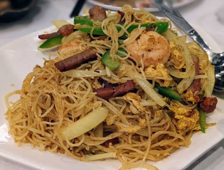 Singapore noodles on a white plate