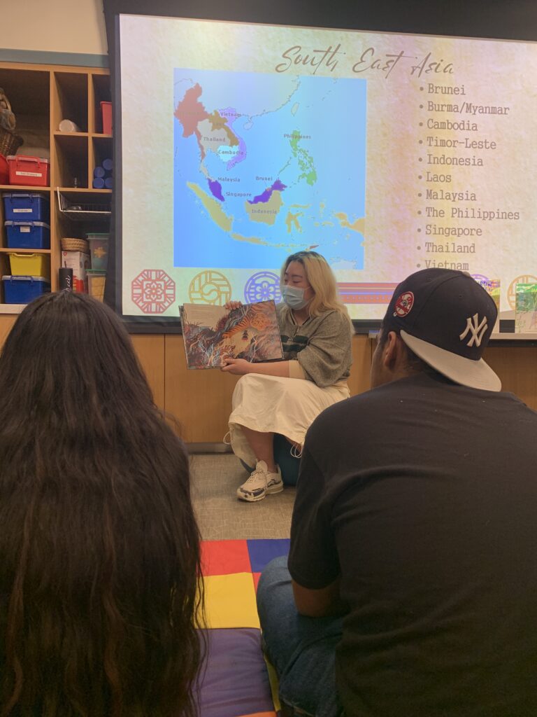 Serena reading a book for story hour